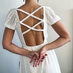 Lulus | White eyelet lace cross back puff sleeve ruffle midi dress | Size S NWT